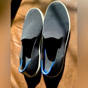 Women’s black Rothy shoe